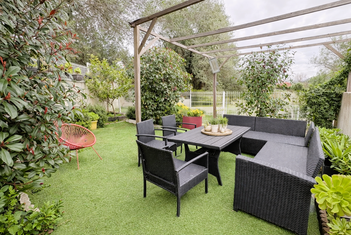 Espace détente sous pergola bois